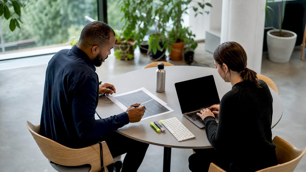 Developers collaborating on code review