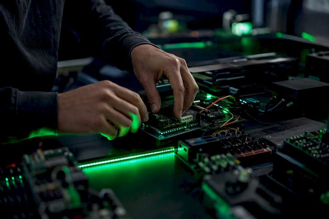 Hands assembling modular tech components